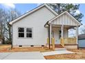 Charming home with a cozy front porch and well-manicured lawn at 228 Chestnut St # 66, Shelby, NC 28150