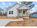 Charming home with a cozy front porch and well-manicured lawn at 228 Chestnut St # 66, Shelby, NC 28150