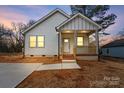 Charming home with a cozy front porch and well-manicured lawn at 228 Chestnut St # 66, Shelby, NC 28150