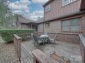 Spacious wooden deck with outdoor table and chairs, perfect for entertaining at 1124 Evergreen Cir, Rock Hill, SC 29732