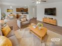 Bright, staged living room with open floor plan and modern furnishings at 1805 Palazzo Dr, Waxhaw, NC 28173