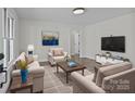 Bright living room with ample seating, modern decor, and great natural light at 515 Richards Rd, Chester, SC 29706