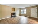 Spacious living room features neutral walls, a fireplace and attractive floors at 830 Wilcrest Ct, York, SC 29745