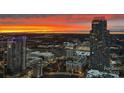 Stunning twilight cityscape view featuring modern high-rise buildings against a vibrant, colorful sky at 210 N Church St # 3606, Charlotte, NC 28202