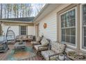 Exterior side patio with ample seating, perfect for outdoor entertainment and relaxation at 530 Wilmot Trl, Gastonia, NC 28056