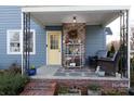 Cozy porch with brick flooring, a decorative shelf, and inviting seating area at 968 Waverly Ave, Rock Hill, SC 29730