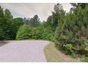 Picturesque lot with mature trees, offering privacy and a serene setting for a new home at Lot 20 Knottywood Ln # Lot 20, Vale, NC 28168