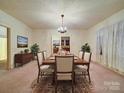 Elegant dining room with a large table, seating for six, and classic decor for memorable gatherings at 113 2Nd St, Spencer, NC 28159