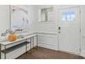 Well-lit foyer featuring modern decor and a view of the front door at 2461 Palmdale Walk Dr, Fort Mill, SC 29708