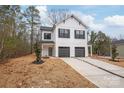 Charming two-story home featuring a modern design and a well-manicured lawn at 2809 New Pineola Rd, Charlotte, NC 28208