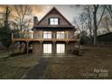 A charming two-story brick home with a spacious deck and well-maintained lawn at 5580 Crepe Myrtle Rd, York, SC 29745