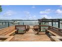 Spacious dock area features seating and clear lake views, perfect for relaxing and enjoying waterfront living at 5580 Crepe Myrtle Rd, York, SC 29745