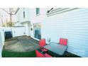 Cozy backyard area with a patio set, ideal for enjoying the outdoors at 7005 Stonington Ln, Charlotte, NC 28227