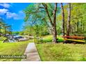 Enjoy lake access with a deeded boat slip, perfect for boating and water activities at 8384 Blades Trl, Denver, NC 28037