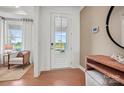 Inviting foyer with hardwood floors and a view to the outside at 4790 Formation Ct # 67, Lancaster, SC 29720
