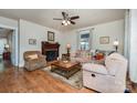 Cozy living room featuring a fireplace, comfortable seating, and natural light at 517 Stockton St, Statesville, NC 28677