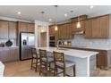 Spacious kitchen with stainless steel appliances, granite countertops, and a large center island at 5911 Wetlands Aly, Charlotte, NC 28215