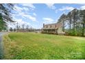 Expansive lawn and a charming single-Gathering home, offering a picturesque and inviting view at 2325 Seymore Ave, Albemarle, NC 28001