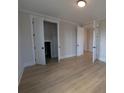 Spacious bedroom with multiple doors and hardwood floors at 251 Luray Way # 441, Rock Hill, SC 29730