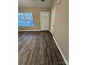 Inviting entryway showcases durable flooring and a conveniently located coat closet at 3121 Strong Box Ln, Gastonia, NC 28052