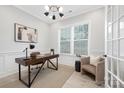 Cozy home office featuring wood floors, lots of natural light, and a modern ceiling light at 600 Campus St, Charlotte, NC 28216