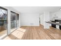 Bright living room with sliding glass doors leading to a patio at 1641 Arlyn Cir # A, Charlotte, NC 28213