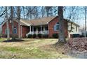 View of a beautiful brick and siding home with a covered front porch at 920 Hunting Ave, Lincolnton, NC 28092