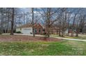 Lovely home with a well-maintained lawn and a side-entry garage at 920 Hunting Ave, Lincolnton, NC 28092