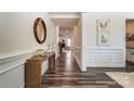 Elegant foyer with hardwood floors, decorative molding, and stylish decor for a grand entrance at 108 Ellsworth Rd # 40, Mooresville, NC 28115