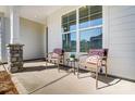 Inviting front porch featuring cozy seating, perfect for relaxing and enjoying the outdoors at 108 Ellsworth Rd # 40, Mooresville, NC 28115