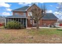 This home features a backyard and screened-in porch, perfect for outdoor living at 1511 35Th Ne Ave, Hickory, NC 28601