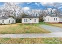 Front exterior of the house on a spacious lot with bare trees and blue sky at 234 Marshall St, Rock Hill, SC 29730