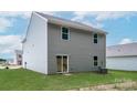 View of the backyard featuring level lawn space and siding at 3270 Maple Ridge Dr, Gastonia, NC 28052