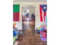 View of the living room with hardwood floors and archway at 642 E Black St, Rock Hill, SC 29730