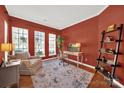 Inviting office features hardwood floors, natural light from three windows, and cozy space at 7203 Shenandoah Dr, Fort Mill, SC 29707