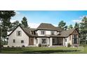 Lovely home featuring a covered patio and beautiful windows to let in natural light at 105 Redbird Ln, Weddington, NC 28104