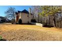 Backyard featuring a wooden fence and spacious lawn at 12504 Ivey Creek Dr, Charlotte, NC 28273