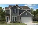 Charming two-story home with gray siding, a front lawn, an attached garage and manicured landscaping at 1498 Hubert Graham Way, Tega Cay, SC 29708