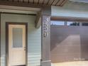 Close up of the house number 3528, a covered porch, and a garage door at 3528 Thunder Rd, Maiden, NC 28650