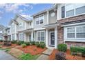 Beautiful townhome with well-kept front yard, inviting entrance, and stone veneer at 706 Cherryfield Pl, Rock Hill, SC 29732