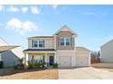 Charming two-story home featuring a two-car garage and well-maintained landscaping at 9022 Colwick Hill Ln, Charlotte, NC 28215