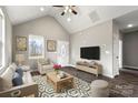 A comfortable living room with vaulted ceilings and large window at 451 Geroid St, Salisbury, NC 28144