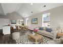 A bright and airy living space is furnished with comfortable seating and stylish decor at 451 Geroid St, Salisbury, NC 28144