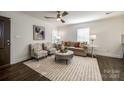 Bright living room with hardwood floors, stylish furniture, and modern decor at 119 N Smallwood Pl, Charlotte, NC 28216