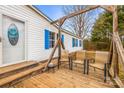 Inviting front porch with swing, perfect for relaxing and enjoying the outdoors at 1691 Hopewell Church Rd, Catawba, NC 28609