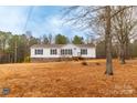 Single story home featuring a covered entrance and lots of acreage in a quiet, serene environment at 1912 Beach Ln, Heath Springs, SC 29058