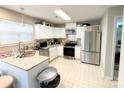 Well-equipped kitchen with modern appliances, granite countertops and white cabinets at 312 Radio Rd, Charlotte, NC 28216
