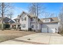 Charming two-story home featuring a spacious driveway and attached two-car garage at 4915 Ardenwoods Dr, Charlotte, NC 28215