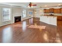 Sunlit open-concept living area boasting hardwood floors and seamless flow to the kitchen at 1062 Baldwin Dr, Lancaster, SC 29720
