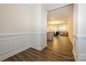 Elegant entryway leads to a spacious living area with hardwood floors and crown molding at 4242 Plumeria Way, Fort Mill, SC 29707
